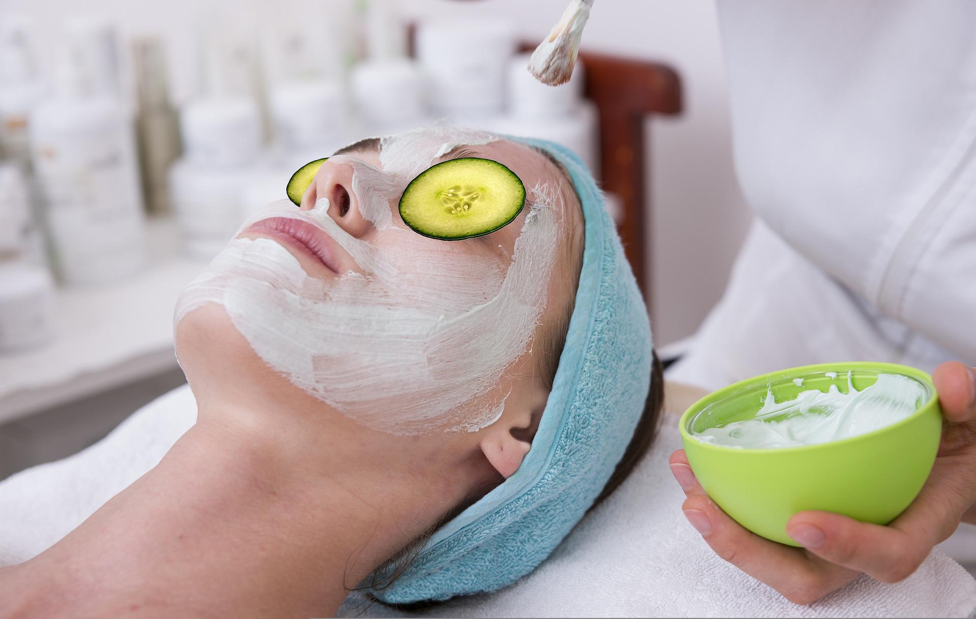 Person getting a cucumber facial
